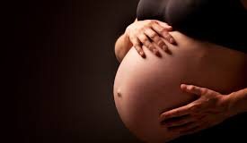 Những dấu hiệu thừa canxi của bà bầu